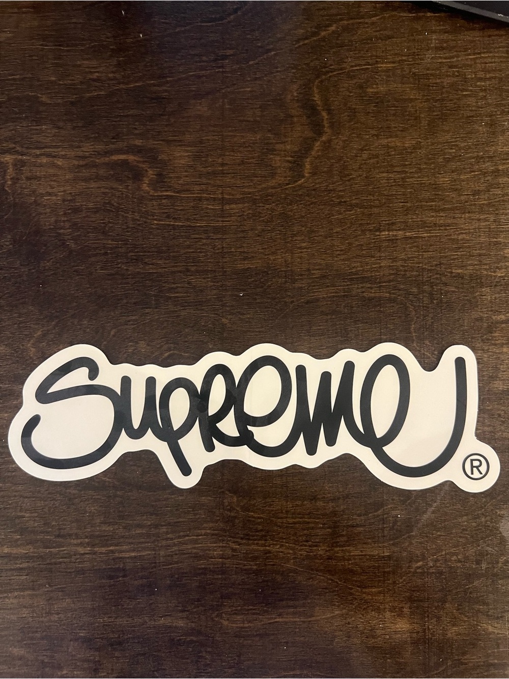 Supreme Black Script Handstyle Logo Sticker on White Outline